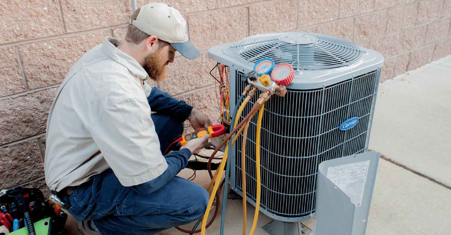HVAC Systems technician diagnosing an air conditioning issue in a renovated ranch home