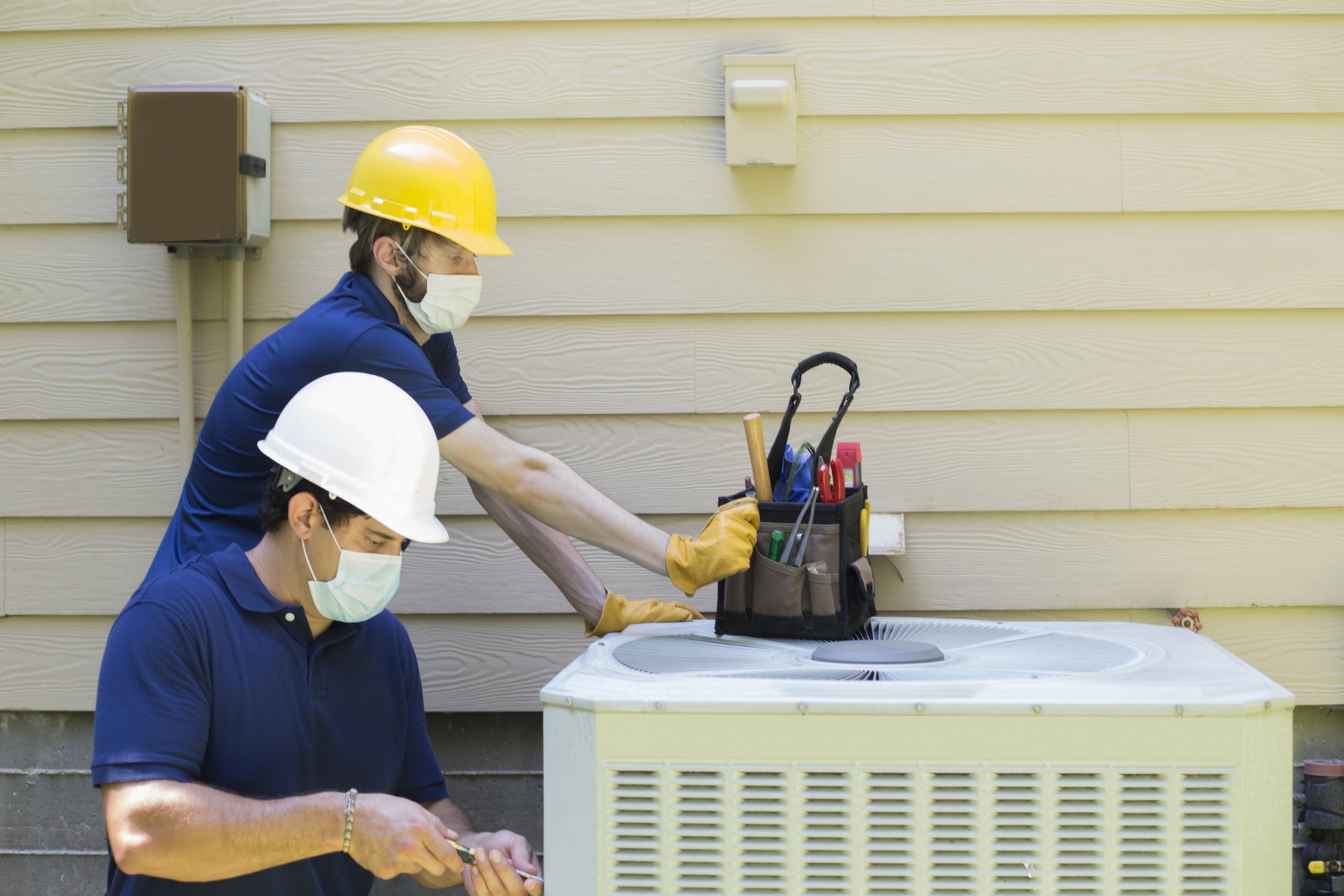 AirFlow Wizards technician performing AC repair in a Simi Valley home