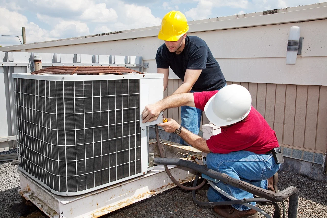 Professional HVAC services Moorpark technician installing system